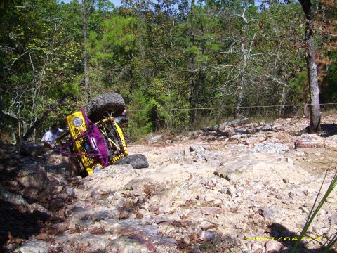 1978 Ford Bronco - An off-road vehicle has overturned while navigating a challenging rocky course.