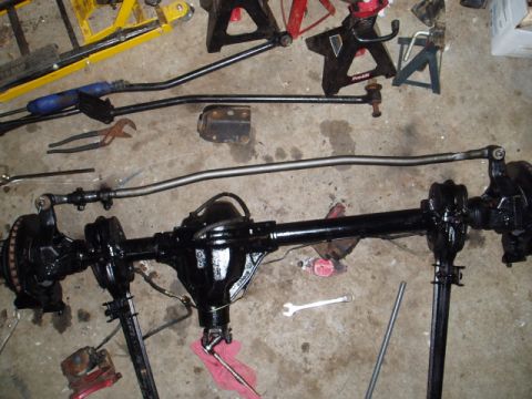1980 Ford Bronco - Lower draglink (tierod) installed. Note I had to use .25" warshers on top of the knuckles for the tierod ends to seat correctly. They are t…
