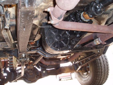 1980 Ford Bronco - The NP205 only hangs down below the frame 2". I dont have the side brace mounted in this picture.