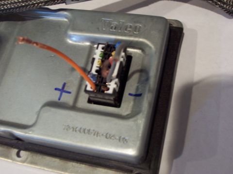 1993 Ford Probe - Close-up of a metal automotive ballast with visible wiring and a brand name.