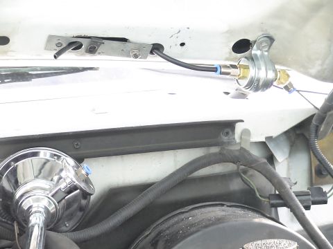 1993 Ford C-350 (Centurion Conversions) - Close-up view of air horn components, including tubing and fittings, installed on a vehicle.