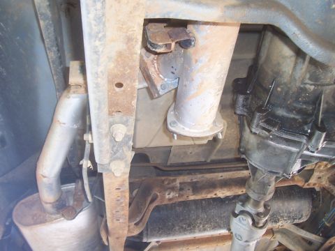 1994 Ford F-150 - Underside view of a 1994 Ford F-150, focusing on the exhaust system and transmission components.