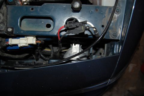 1985 Mercury Grand Marquis - Wiring and headlight assembly detail, not identifiable to a specific vehicle year or model.