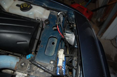 1985 Mercury Grand Marquis - Wiring and components visible in the engine compartment of a vehicle.