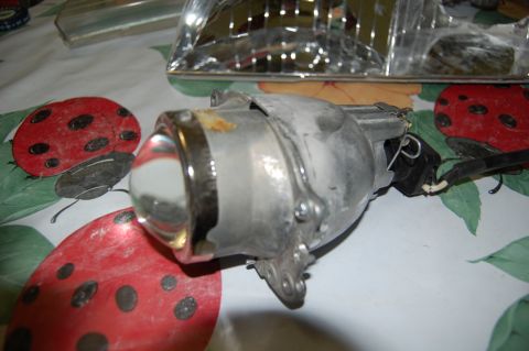 1985 Mercury Grand Marquis - A close-up view of a headlight projector assembly, likely for a custom retrofit project.