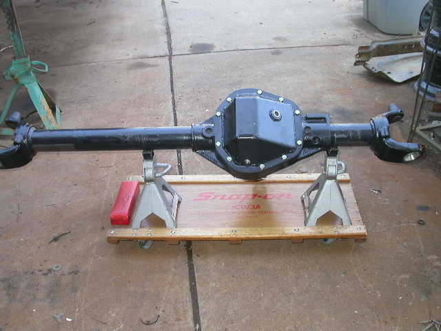 At long last, the D60 gets wheeled out of the shop!  Pushing it around on a creeper is much easier than trying to lug this heavy bastard by yourself.