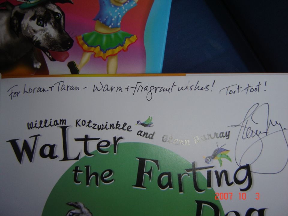 Book cover with illustrations of a dog and a girl, signed by William Kotzwinkle and Glenn Murray