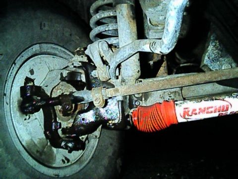 1989 Ford Bronco - Front spring view with the steering stabilizer.