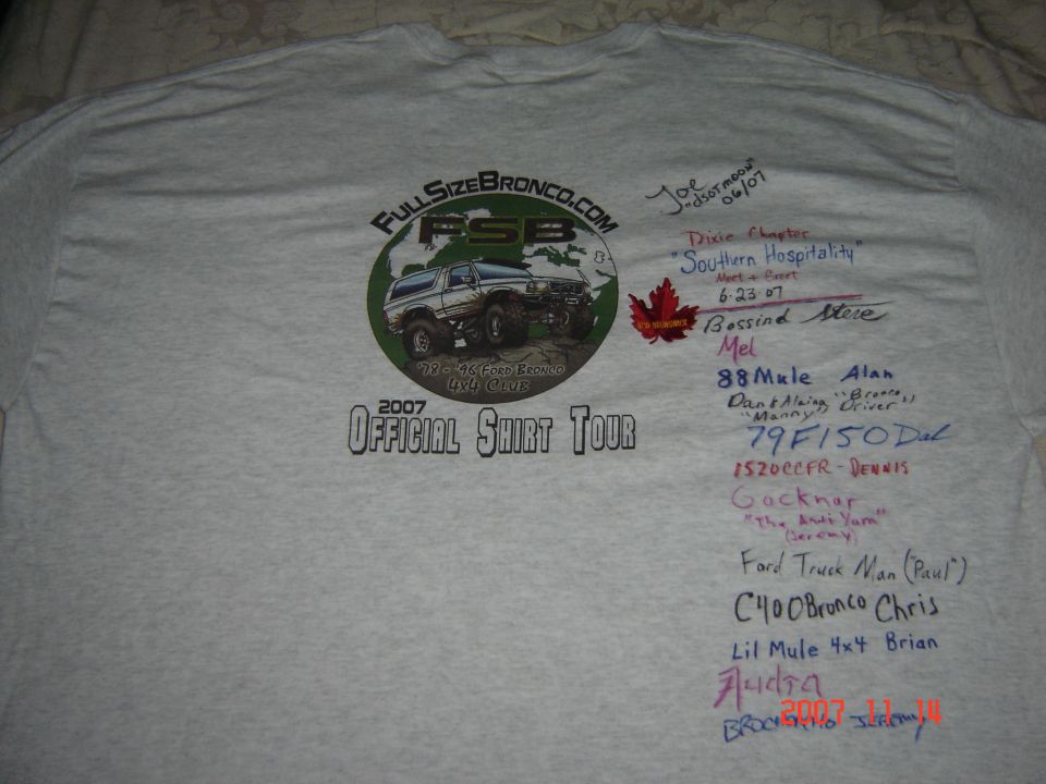 Gray t-shirt with a circular graphic of a lifted Bronco and text, surrounded by handwritten names and dates