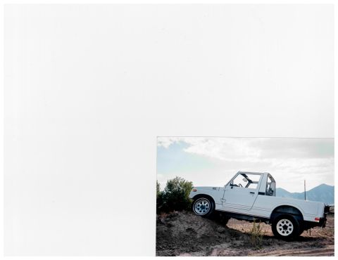 1988 Suzuki Samurai - This 1988 Suzuki Samurai is shown on a dirt incline, highlighting its off-road capabilities.