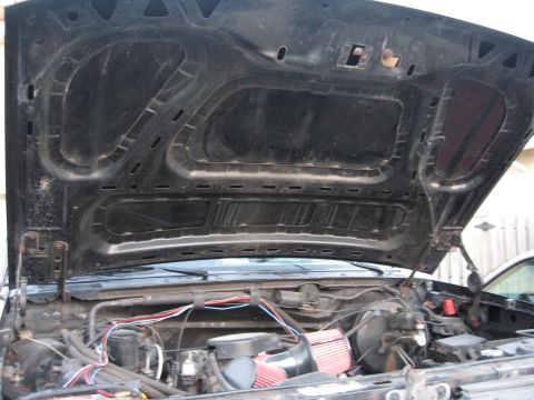 1994 Ford Bronco - The open hood reveals the engine bay and wiring, with a visible Supermotors.net watermark.