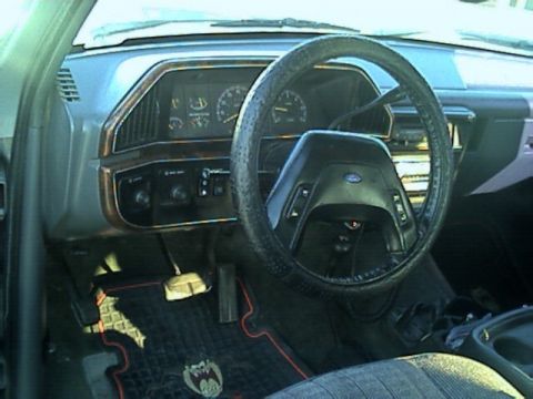 1989 Ford Bronco - Driver's side shot/ stock cluster
