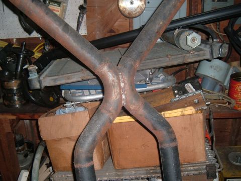 1981 Ford LTD - This is what a skillfully crafted home made X-pipe looks like leaning against a pile of junk. Why isn't it under the car efficiently channe…