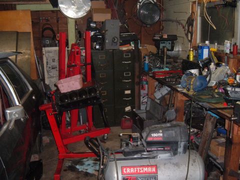 1981 Ford LTD - My workspace with the block on the stand waiting, anticipating for some new parts to set her free.