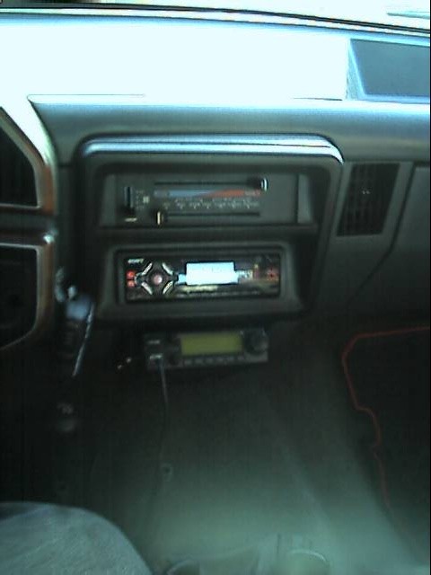 1989 Ford Bronco - Air/CD/2 meter HAM radio setup. Since I don't smoke, it fit in the ashtray slot once it was removed.