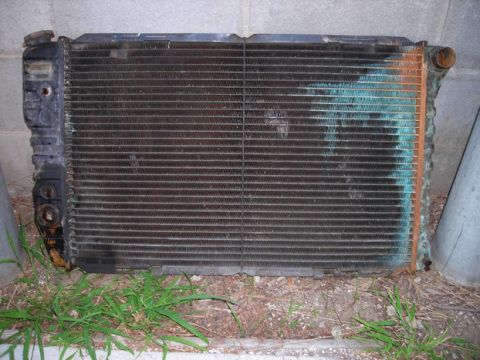 1979 Ford Ranchero - Radiator part, likely for a vehicle, with some staining.