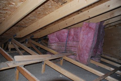 1996 Ford Bronco - Attic framing and insulation installation.
