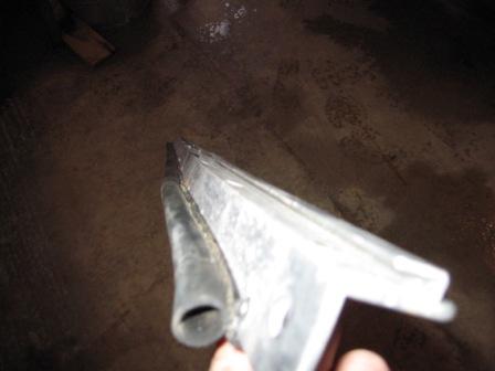1993 Ford Bronco - Rear fast track rail with seal. This is looking down the outside channel that the "fast track" plastic slides into