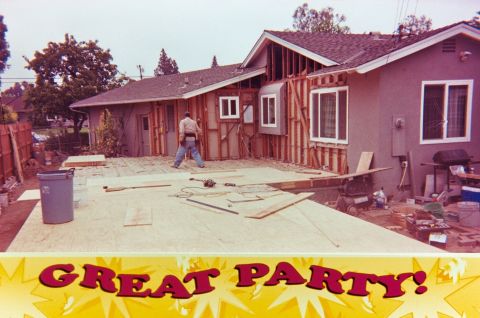 1989 Ford F-250 - House construction in progress with framing and materials visible on the patio area.