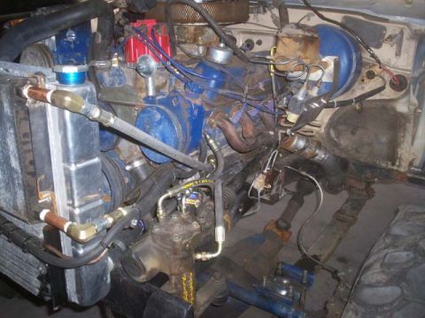1982 Toyota 4Runner - Close-up view of a vehicle's engine bay, showing various components and wiring.