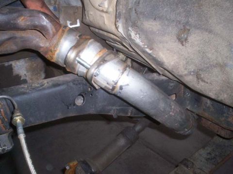 1982 Toyota 4Runner - Close-up view of an exhaust pipe modification on a vehicle.