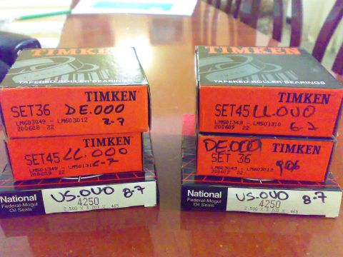 1995 Ford F-150 - Boxes of Timken tapered roller bearings and National Federal-Mogul oil seals are stacked on a table.