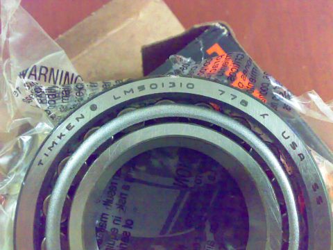 1995 Ford F-150 - A Timken bearing is shown in its packaging, with part numbers visible.