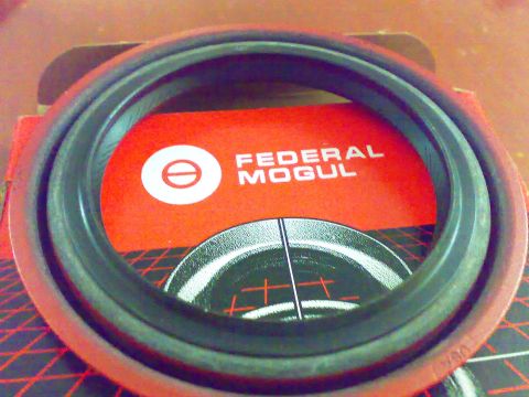 1995 Ford F-150 - A wheel bearing seal is shown with its Federal Mogul packaging in the background.