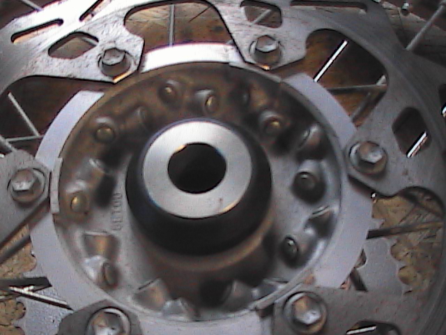 Motorcycle wheel hub with spokes and brake rotor