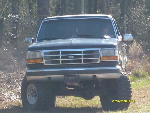 1992 Ford Bronco - Front view of a 1992 Ford Bronco parked outdoors.