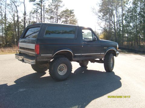 1992 Ford Bronco - This lifted 1992 Ford Bronco is shown from the rear 3/4 angle.