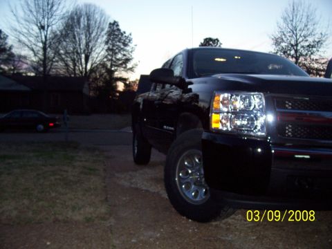 2008 Chevrolet Silverado 1500 - Black Chevrolet Silverado 1500 pickup truck seen from the front passenger side.