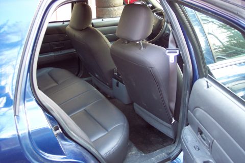 2001 Ford Crown Victoria - Rear interior view of a blue 2001 Ford Crown Victoria sedan.