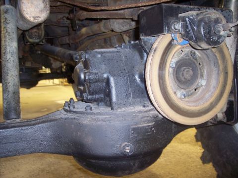 1984 GMC Sierra 3500 - Rear axle assembly showing the differential and brake components.
