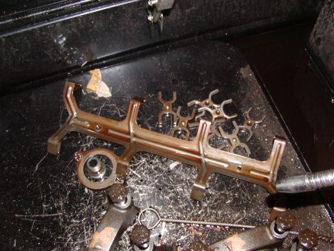 1991 Ford Bronco - Engine fuel rail and injectors removed from vehicle, placed in a parts tray.