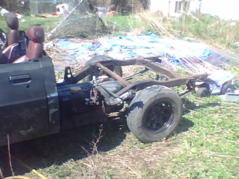 1981 Dodge Power Ram - This image shows the chassis and partial cab of a truck, with visible text from Supermotors.net.