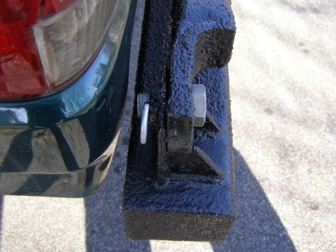1993 Ford Bronco - Trailer hitch receiver mounted on the rear bumper assembly.