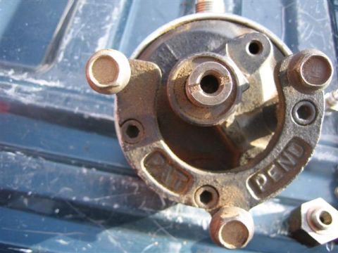 1994 Ford Bronco - A close-up view of a metal automotive component with patent pending markings.