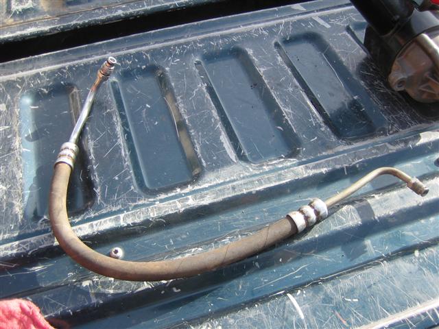 Power steering hose on a truck bed