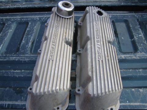 1994 Ford Bronco - A pair of Ford-branded valve covers are shown, one with an oil cap attached.