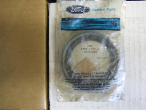 1994 Ford Bronco - Ford retainer part E4TZ-1190-A is shown in its original service parts packaging.