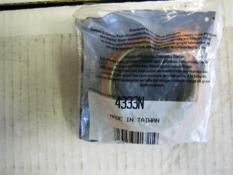 1994 Ford Bronco - A Timken wheel bearing seal is shown in its plastic packaging, with part number 4333N visible.