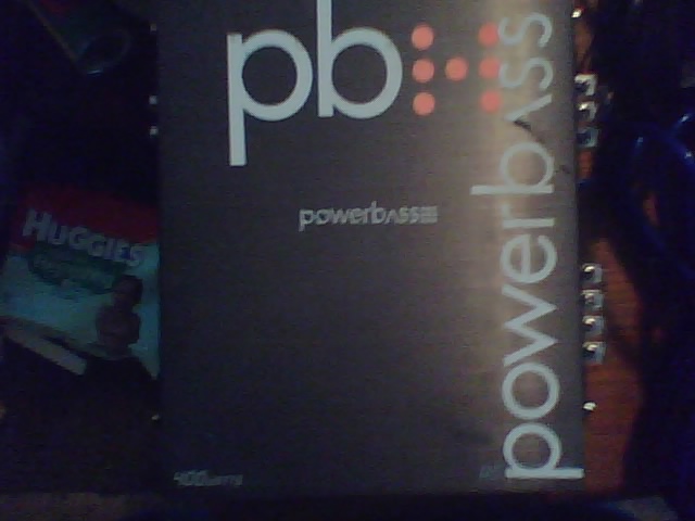 Powerbass car amplifier with "pb" logo and "powerbass" text
