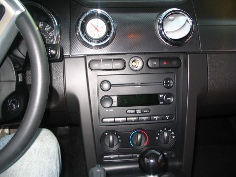 2007 Ford Mustang - Interior view of a car's dashboard, showing the center console and driver's side.