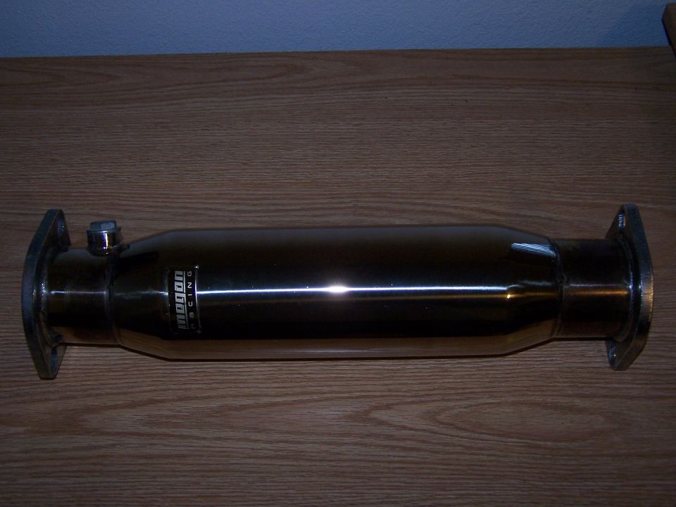 Shiny exhaust pipe with "mugen racing" logo and flanges on ends