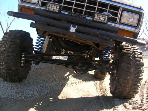 1985 Ford Bronco II - This modified Ford Bronco II features an upgraded suspension system and large off-road tires.