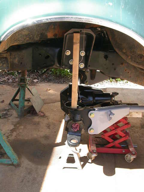 1990 Ford Bronco - Made a story board to work as a go/no go gauge for the proper compressed coil height. It greatly speeds set up.