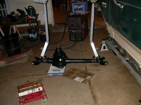 1990 Ford Bronco - Make sure your tack welds are strong, because the next step is to wheel it out from under the truck to do the finish welds.