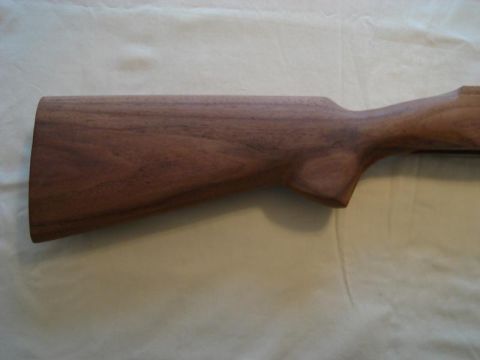 1991 Ford Bronco - Unfinished wooden rifle stock shown from the side.