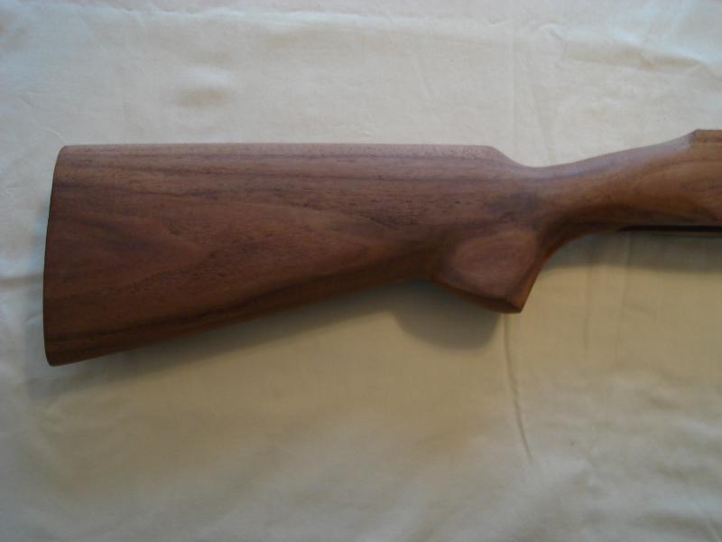 Wooden rifle stock, unfinished, side profile